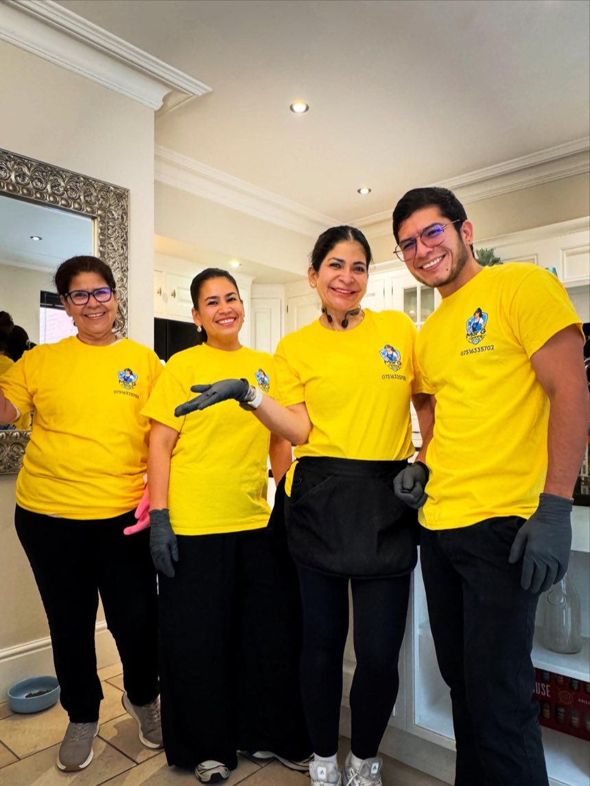 The Mar G Cleaning Services team in uniform at a client&rsquo;s home